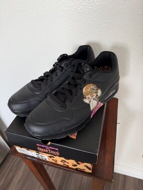 Skechers Black Men's Low-Top Sneakers with Graphic Accent